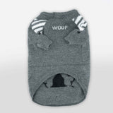 „Woof“ grauer Wollpullover mit schwarz/weißen Details